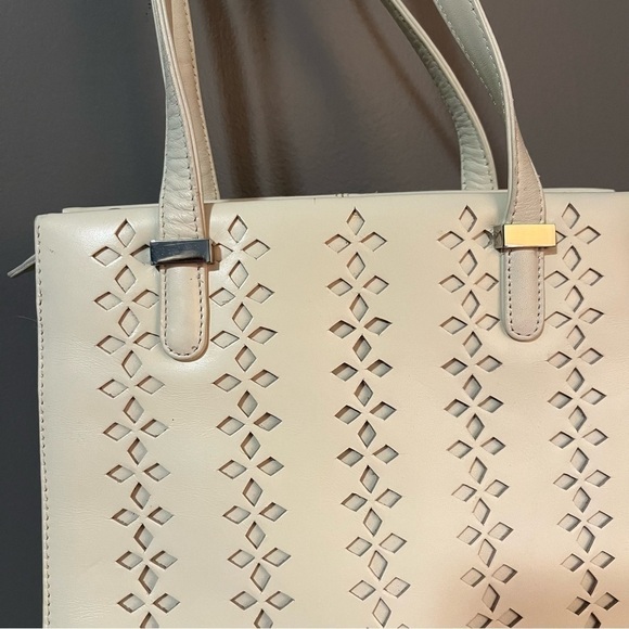 Dillards vintage Leather Ivory Purse
Perforated Diamond Pattern - Picture 3 of 13